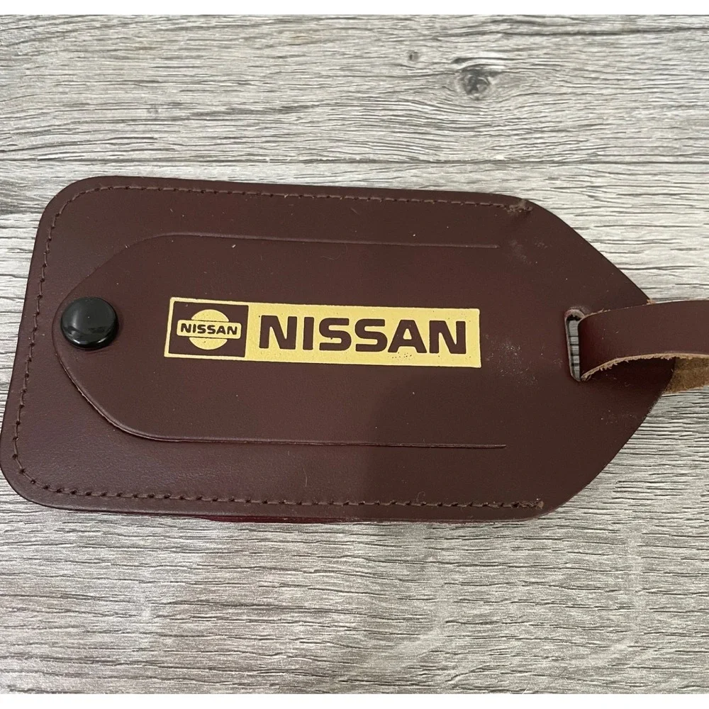 Vintage 1987 New Car Show Nissan Leather Luggage Tag Brown Gold Commemorative‎